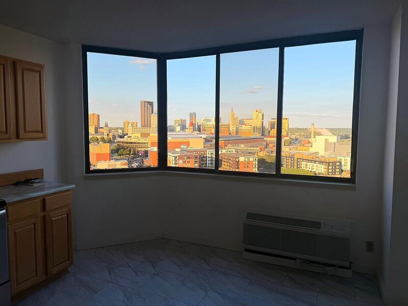 Bay window overlooking the downtown St. Paul skyline in a freshly cleaned apartment